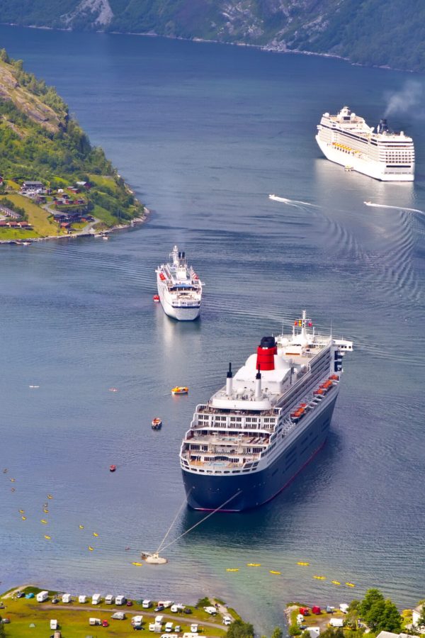 End of the famous Geiranger fjord, Norway with cruise ships